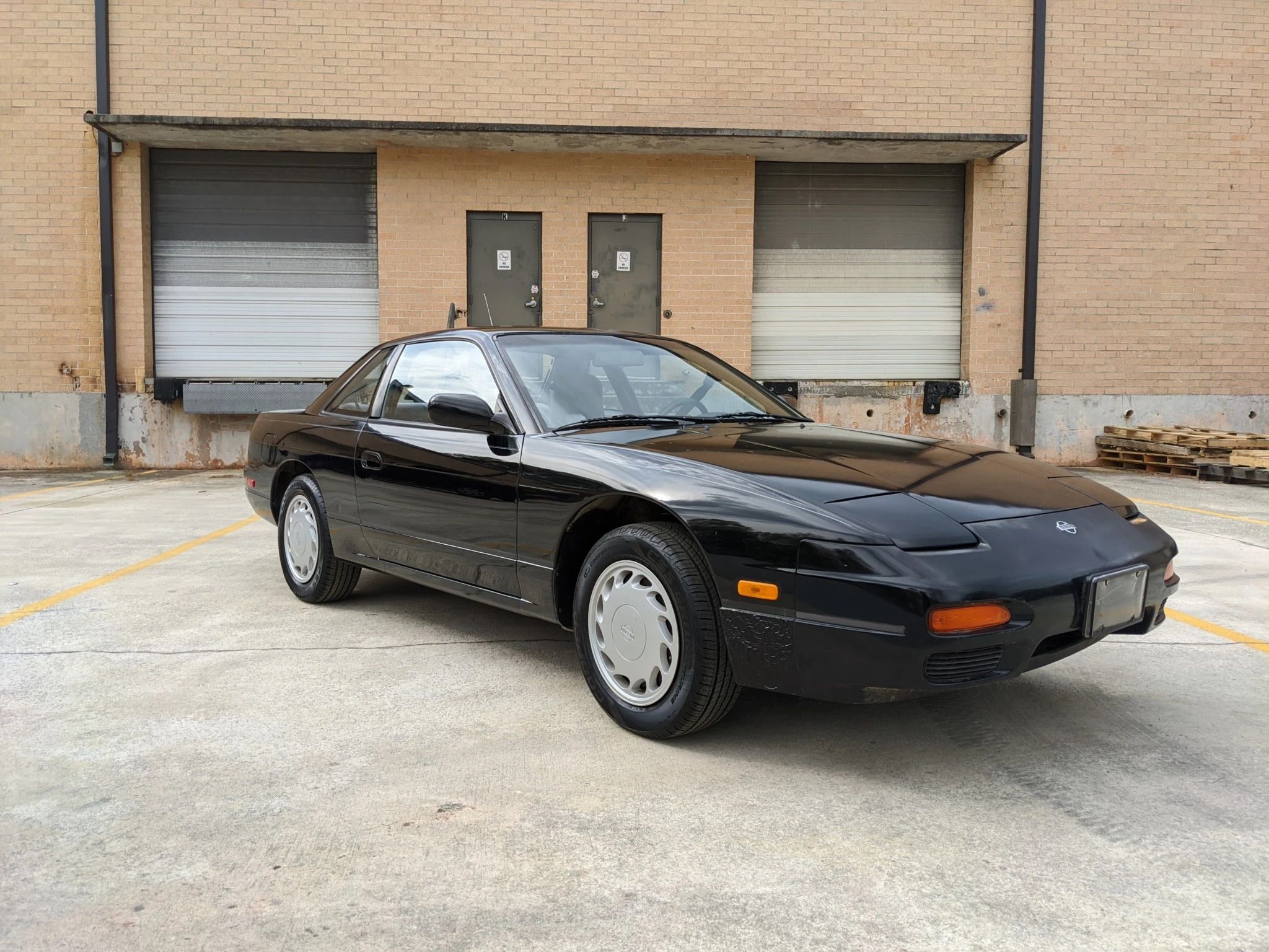Black 1993 Nissan 240SX Parked